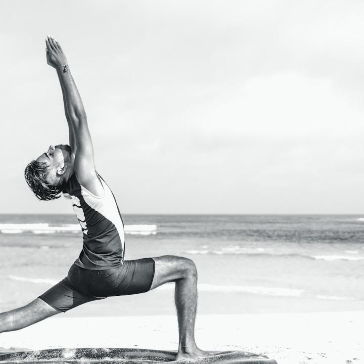 Women in a fitness class doing stretching and mobility exercises